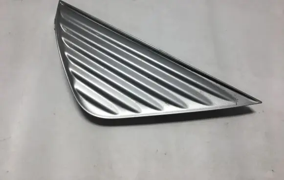 Toyota Aygo AB40 Under headlight/headlamp trim 52115-0H050