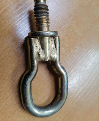 Towing hook eye