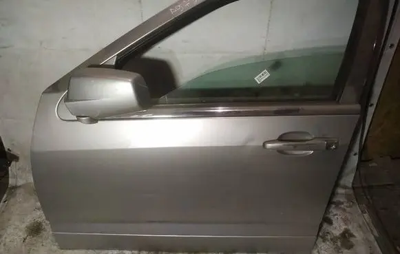 Cadillac SRX Front door pilkos
