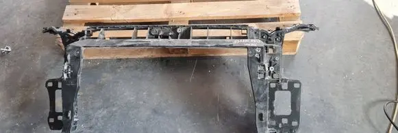 Radiator support slam panel