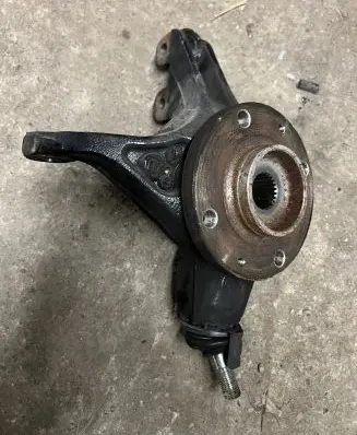 Front wheel hub spindle knuckle