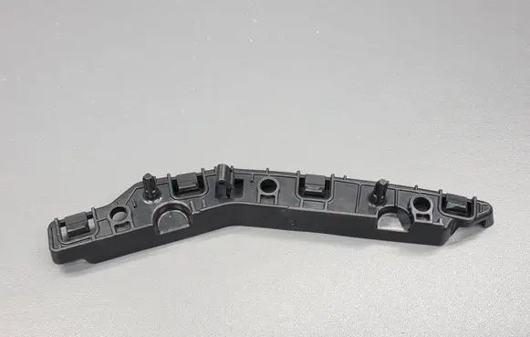 Peugeot 2008 II Front bumper mounting bracket 9825853780
