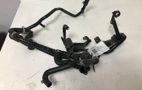 Volkswagen Golf VII Engine coolant pipe/hose 04L121064G