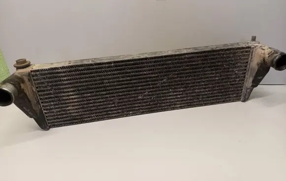 Opel Frontera B Intercooler radiator 97142017