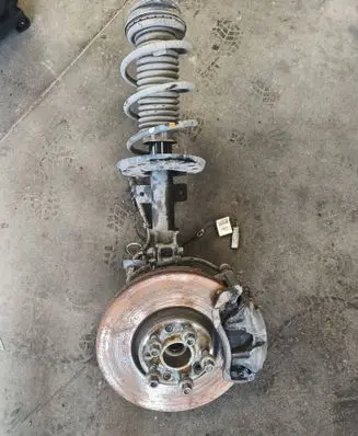 Opel Astra L Front shock absorber with coil spring 