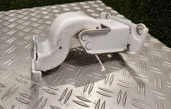 Rear door upper hinge
