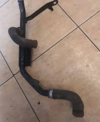 Volkswagen PASSAT B5 Engine coolant pipe/hose 048121063 048103241