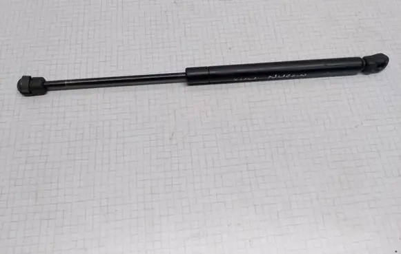 Nissan Maxima Front bonnet/hood damper/strut 654712Y010
