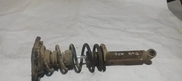 Nissan Almera Tino Rear shock absorber with coil spring 