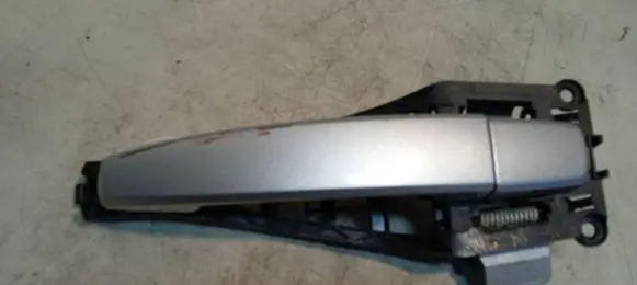 Opel Zafira B Front door exterior handle 24463524