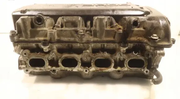 Suzuki Swift I Engine head V10MS25
