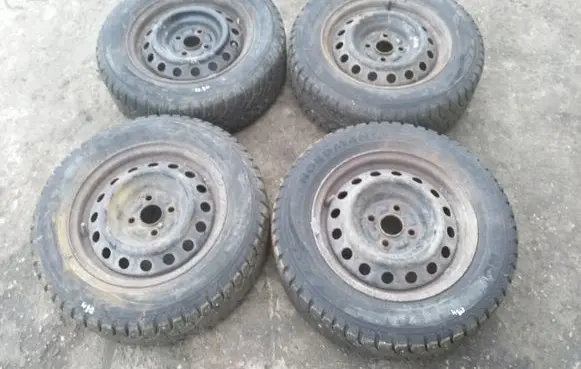 Toyota Corolla E120 E130 R14 winter/snow tires with studs NORDMAN4 18565R14