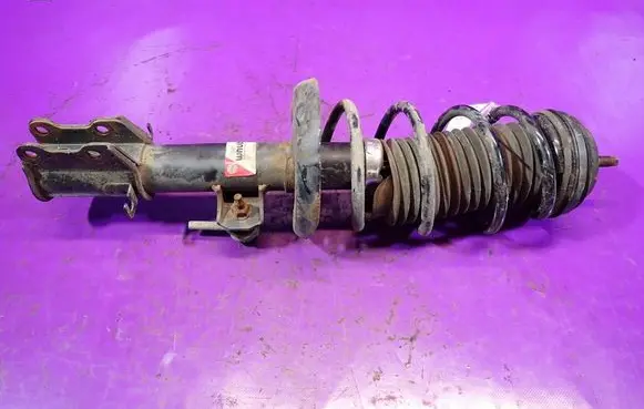 Opel Corsa D Front shock absorber with coil spring