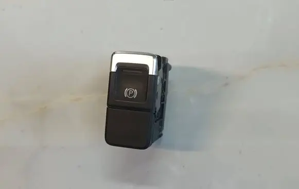 Volkswagen Touareg II Hand parking brake switch 7P1927225D