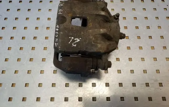 Hyundai Tucson JM Front brake caliper