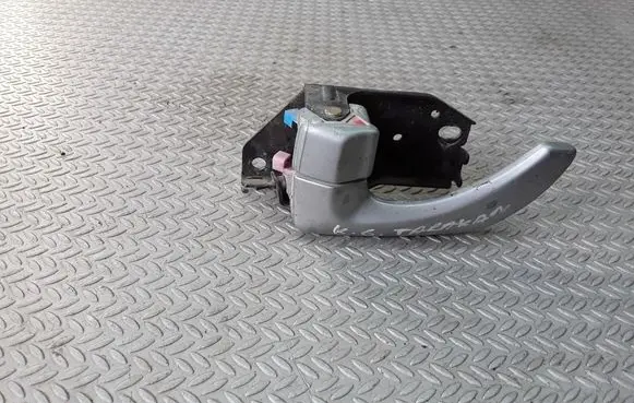 Rear door interior handle