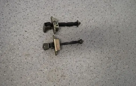 Nissan Micra Front door check strap stopper
