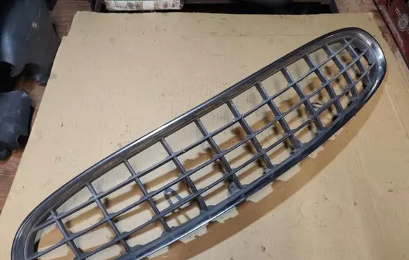 Chrysler Sebring (ST-22 - JR) Front bumper upper radiator grill 04805382AB
