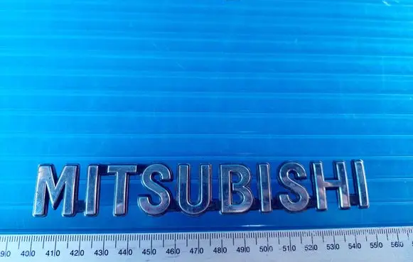 Mitsubishi Lancer X Rear door emblem/model letters DVI30292 4B88072041