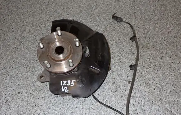 Front wheel hub spindle knuckle