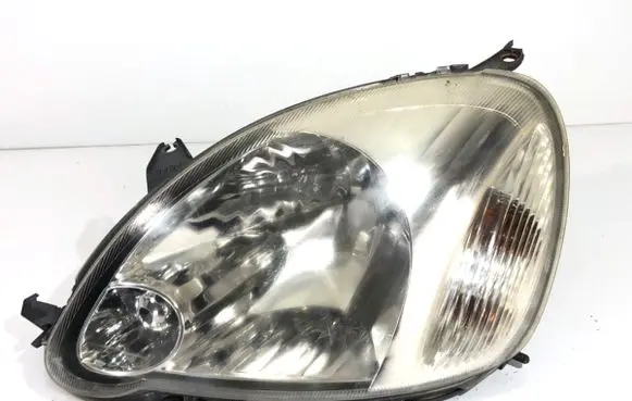 Toyota Yaris Headlight/headlamp 89007614
