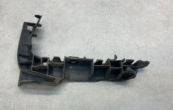Front bumper mounting bracket