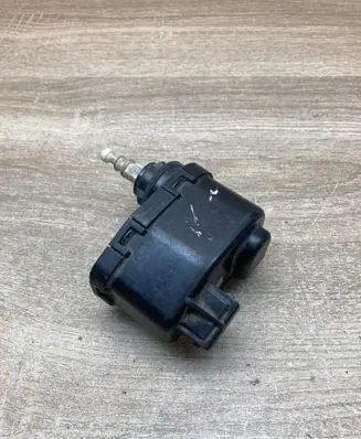 Volkswagen Golf III Headlight level adjustment motor 1H0941295 00437547