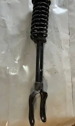 Front shock absorber with coil spring