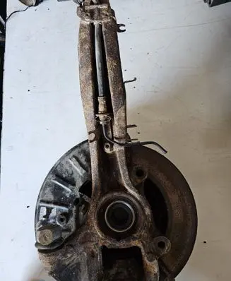 Volkswagen Touareg II Front wheel hub spindle knuckle 7P6467246A