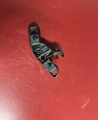 Front bumper mounting bracket