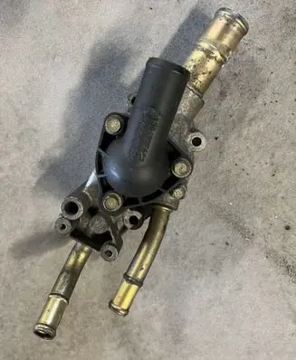 Thermostat/thermostat housing