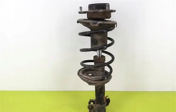 Toyota Avensis T220 Front shock absorber with coil spring