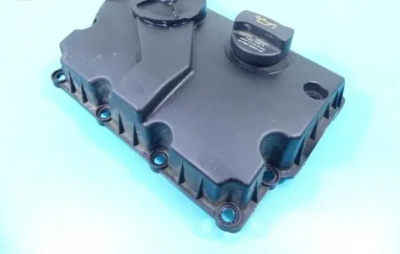 Rocker cam cover