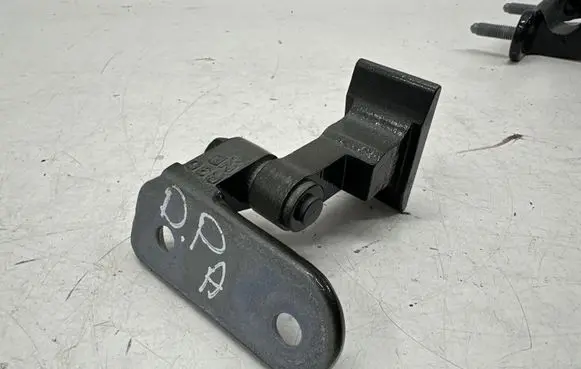 Front door lower hinge