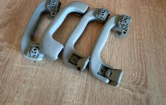 Front interior roof grab handle