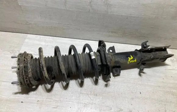 Ford Fiesta Front shock absorber with coil spring H1BC18045AC