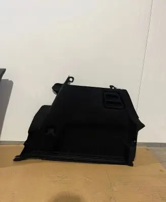 Trunk/boot lower side trim panel