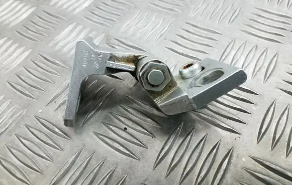 Rear door upper hinge