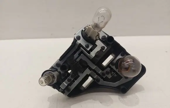 Volkswagen Touran II Tail light bulb cover holder 1T0945257