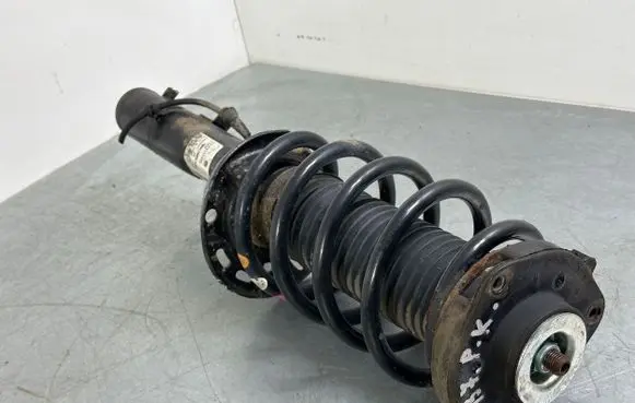 Front shock absorber with coil spring