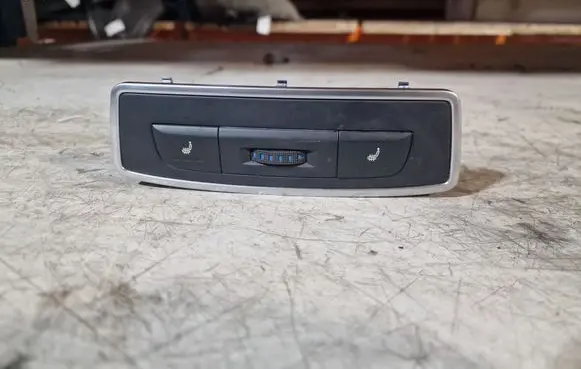 Seat heating switch