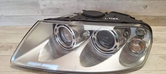 Volkswagen Touareg I Headlight/headlamp 7L6941017BG 89307855 7L6941017