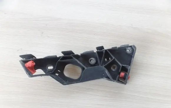Opel Corsa D Front splash guards bracket 13179964