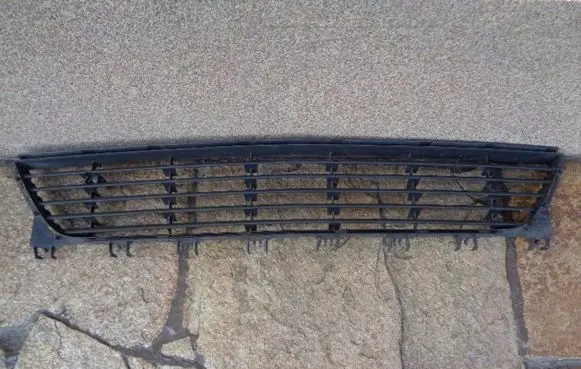 Opel Corsa C Front bumper lower grill 13120833