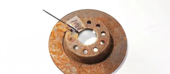 Volkswagen PASSAT B6 Rear brake disc neventiliuojamas