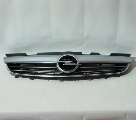 Opel Zafira B Front bumper upper radiator grill 13247331