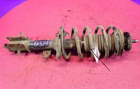 Chevrolet Kalos Front shock absorber with coil spring