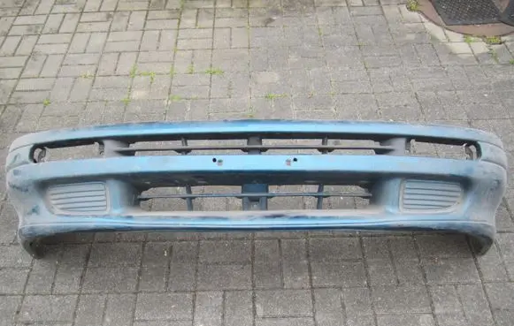 Subaru Impreza I Front bumper 57720FA000 57720FA010