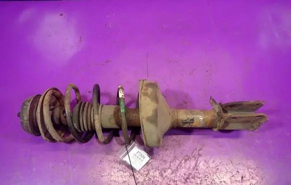 Renault Thalia I Front shock absorber with coil spring 