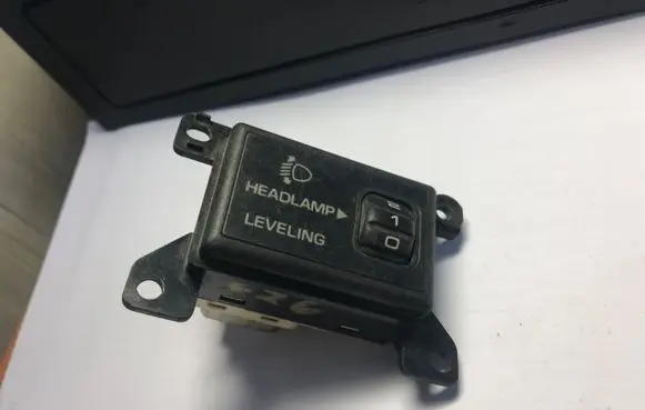 Mazda 626 Headlight level height control switch